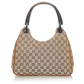 Bolso de hombro de lona Gucci GG