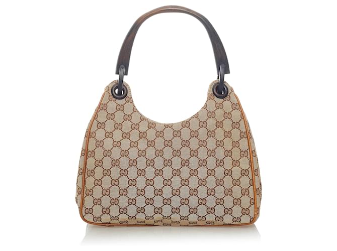 Bolso de hombro de lona Gucci GG