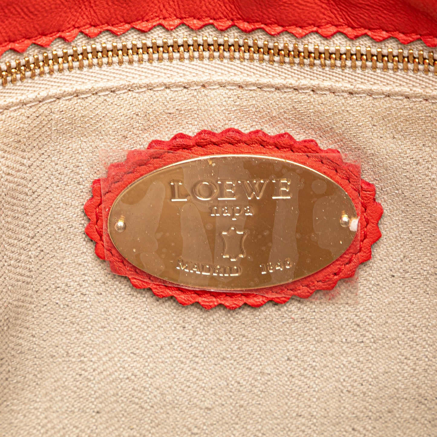 Loewe Embossed Leather Flamenco Tassel Crossbody