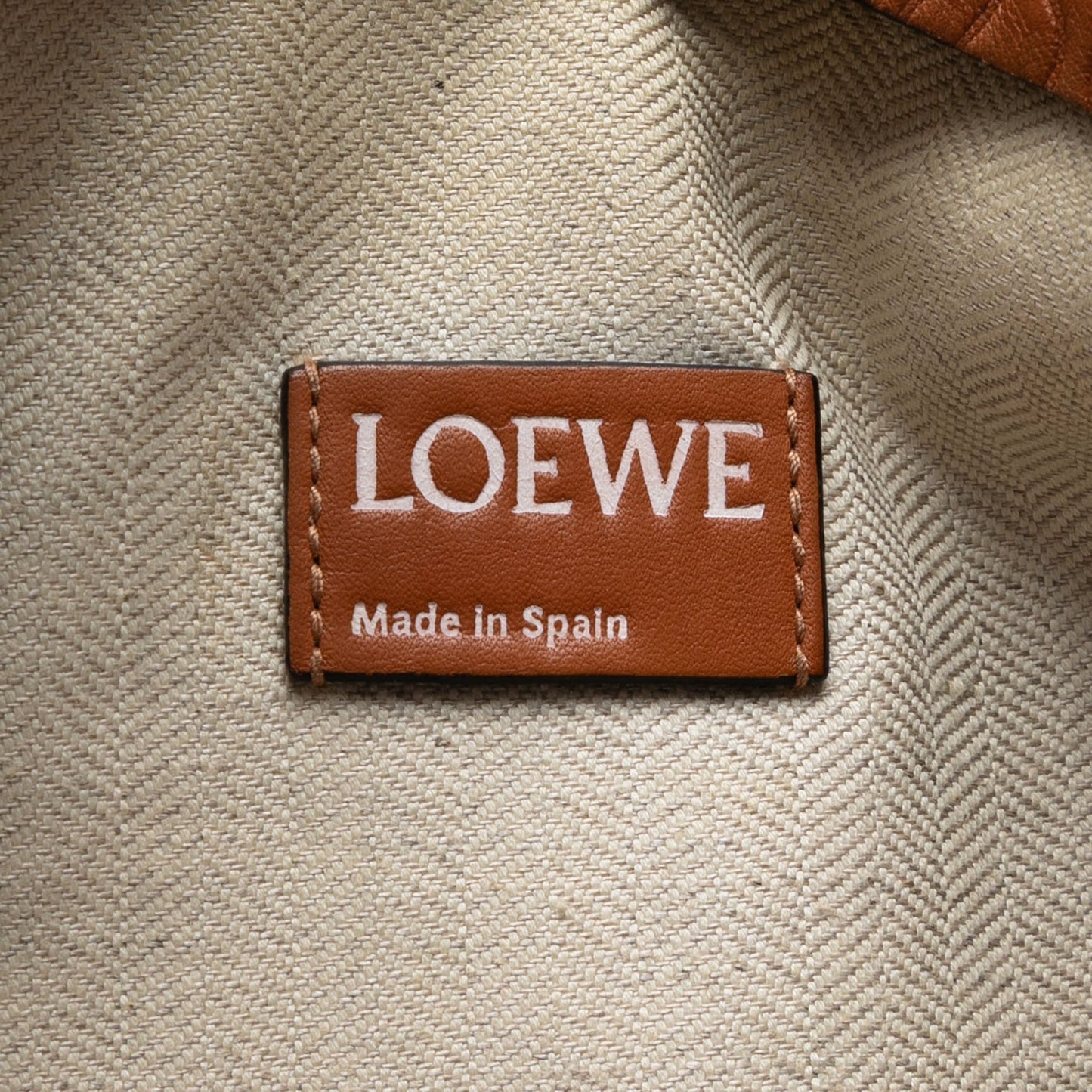 Loewe Embossed Anagram Leather Repeat T Clutch